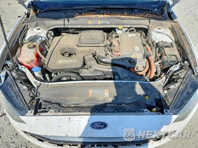 Zdjęcie 11 z 12 samochodu: 2017 FORD FUSION SE HYBRID VIN:3FA6P0LU7HR231208 - miniatura