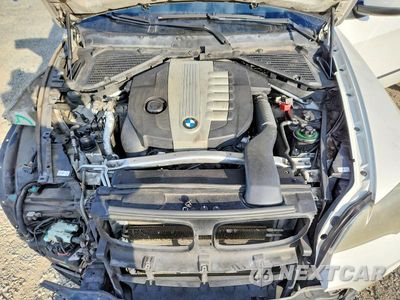 Zdjęcie 12 z 14 samochodu: 2010 BMW X5 XDRIVE35D VIN:5UXFF0C53ALJ99902 - miniatura
