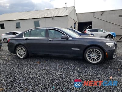 Czwarte zdjęcie samochodu z boku: 2014 BMW 7ER LXI VIN:WBAYF8C54ED142517 - miniatura