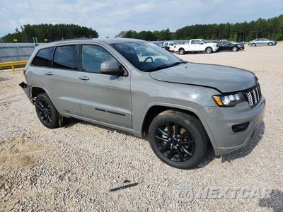 Czwarte zdjęcie samochodu z boku: 2021 JEEP GRAND CHEROKEE LAREDO VIN:1C4RJEAG8MC719062 - miniatura