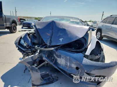 Piąte zdjęcie samochodu w środku: 2022 TESLA MODEL 3 VIN:5YJ3E1ECXNF114118 - miniatura