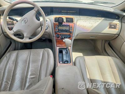 Zdjęcie 8 z 12 samochodu: 2003 TOYOTA AVALON XL VIN:4T1BF28B03U290578 - miniatura