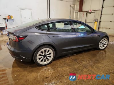 Trzecie zdjęcie samochodu z tyłu: 2023 TESLA MODEL 3 VIN:5YJ3E1EA6PF438359 - miniatura