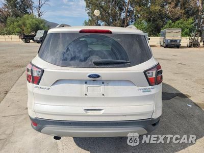 Zdjęcie 6 z 13 samochodu: 2018 FORD ESCAPE TITANIUM VIN:1FMCU0J90JUA04666 - miniatura