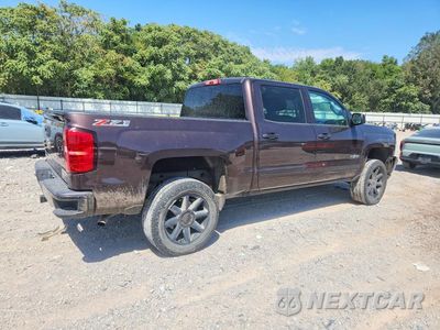 Trzecie zdjęcie samochodu z tyłu: 2016 CHEVROLET SILVERADO K1500 LT VIN:3GCUKREC9GG302508 - miniatura