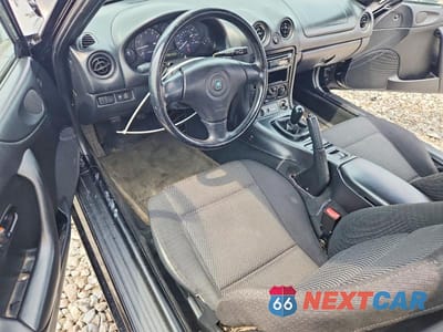 Zdjęcie 8 z 12 samochodu: 1999 MAZDA MX-5 MIATA VIN:JM1NB3533X0102407 - miniatura