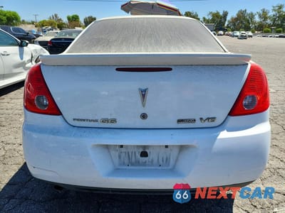 Zdjęcie 6 z 12 samochodu: 2009 PONTIAC G6 VIN:1G2ZJ57K094260272 - miniatura
