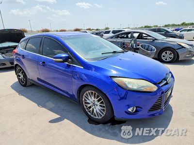 Czwarte zdjęcie samochodu z boku: 2014 FORD FOCUS TITANIUM VIN:1FADP3N26EL176832 - miniatura