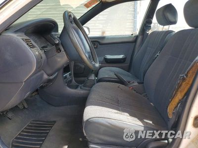 Zdjęcie 7 z 12 samochodu: 1994 TOYOTA COROLLA BASE VIN:1NXAE04B9RZ199908 - miniatura