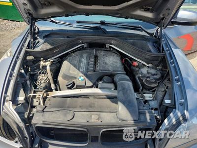 Zdjęcie 12 z 14 samochodu: 2013 BMW X5 XDRIVE35I VIN:5UXZV4C54D0B10337 - miniatura