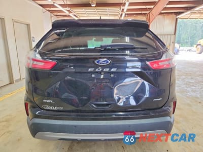 Zdjęcie 6 z 13 samochodu: 2022 FORD EDGE SEL VIN:2FMPK4J90NBA52761 - miniatura