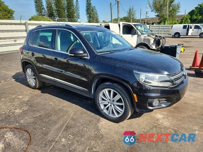 Czwarte zdjęcie samochodu z boku: 2013 VOLKSWAGEN TIGUAN S VIN:WVGAV3AX8DW600900 - miniatura