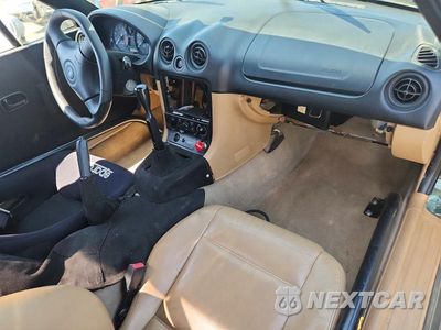 Zdjęcie 8 z 12 samochodu: 1999 MAZDA MX-5 MIATA VIN:JM1NB3532X0119733 - miniatura