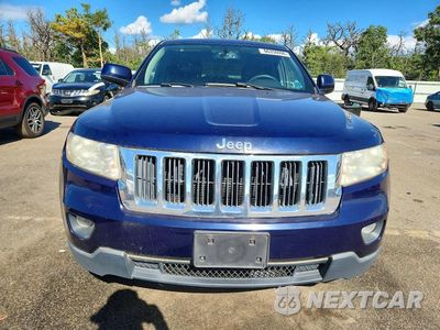 Piąte zdjęcie samochodu w środku: 2012 JEEP GRAND CHEROKEE LAREDO VIN:1C4RJFAG3CC216656 - miniatura
