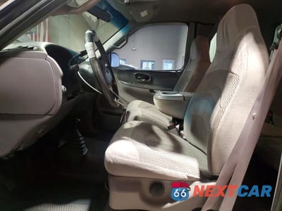 Zdjęcie 7 z 12 samochodu: 2000 FORD F150 VIN:1FTRX18WXYNC25025 - miniatura