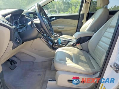 Zdjęcie 7 z 13 samochodu: 2014 FORD ESCAPE TITANIUM VIN:1FMCU0JX8EUE20405 - miniatura