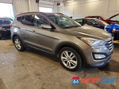 Czwarte zdjęcie samochodu z boku: 2013 HYUNDAI SANTA FE SPORT 2.0T VIN:5XYZUDLA8DG012307 - miniatura