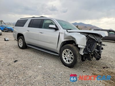 Czwarte zdjęcie samochodu z boku: 2015 GMC YUKON XL K1500 SLT VIN:1GKS2HKC7FR691822 - miniatura
