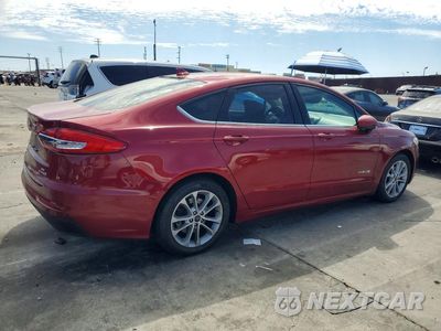 Trzecie zdjęcie samochodu z tyłu: 2019 FORD FUSION SE VIN:3FA6P0LU6KR242417 - miniatura
