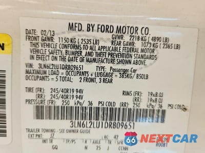 Zdjęcie 13 z 13 samochodu: 2013 LINCOLN MKZ HYBRID VIN:3LN6L2LU1DR809651 - miniatura