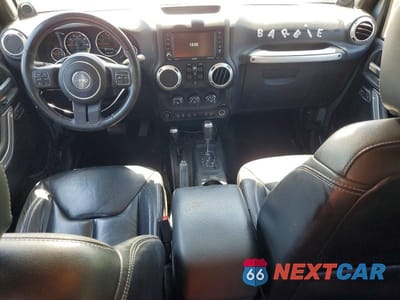Zdjęcie 8 z 13 samochodu: 2013 JEEP WRANGLER UNLIMITED SAHARA VIN:1C4BJWEGXDL548221 - miniatura