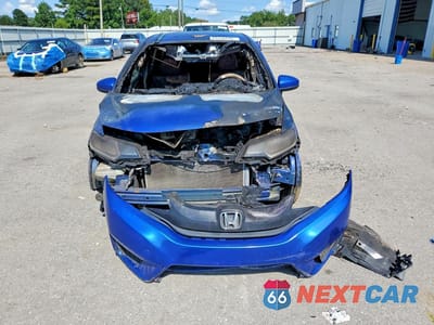 Piąte zdjęcie samochodu w środku: 2015 HONDA FIT LX VIN:3HGGK5H50FM714160 - miniatura