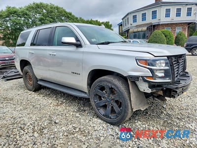 Czwarte zdjęcie samochodu z boku: 2019 CHEVROLET TAHOE K1500 LT VIN:1GNSKBKC3KR252854 - miniatura