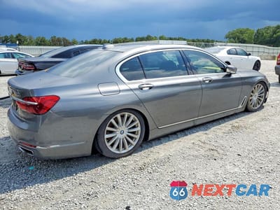 Trzecie zdjęcie samochodu z tyłu: 2016 BMW 740 I VIN:WBA7E2C5XGG714526 - miniatura