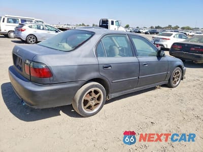 Trzecie zdjęcie samochodu z tyłu: 1998 HONDA CIVIC LX VIN:JHMEJ6678WS015061 - miniatura