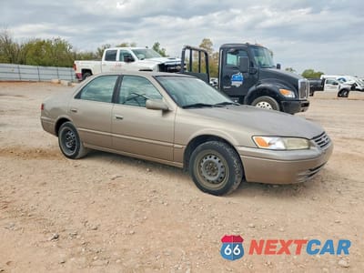 Czwarte zdjęcie samochodu z boku: 1999 TOYOTA CAMRY LE VIN:4T1BG22K0XU520518 - miniatura