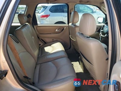 Zdjęcie 10 z 12 samochodu: 2002 MAZDA TRIBUTE LX VIN:4F2YU08142KM22591 - miniatura