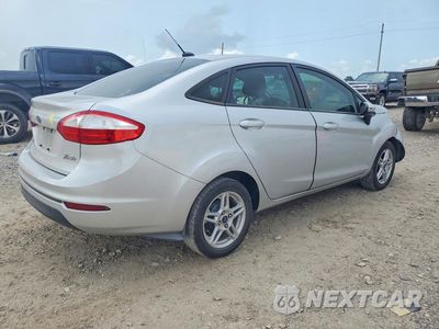 Trzecie zdjęcie samochodu z tyłu: 2017 FORD FIESTA SE VIN:3FADP4BJXHM166180 - miniatura