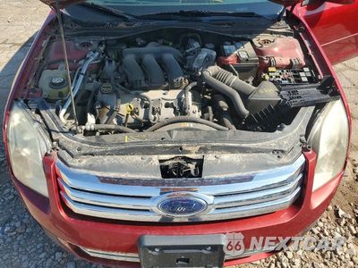 Zdjęcie 11 z 12 samochodu: 2009 FORD FUSION SE VIN:3FAHP07139R193437 - miniatura