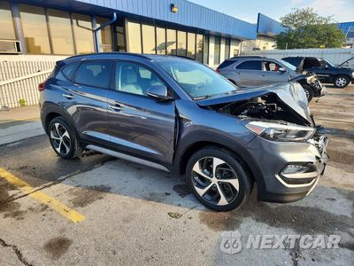 Czwarte zdjęcie samochodu z boku: 2017 HYUNDAI TUCSON LIMITED VIN:KM8J3CA24HU431745 - miniatura