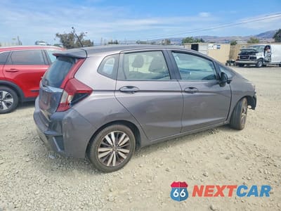 Trzecie zdjęcie samochodu z tyłu: 2016 HONDA FIT EX VIN:JHMGK5H86GS016233 - miniatura