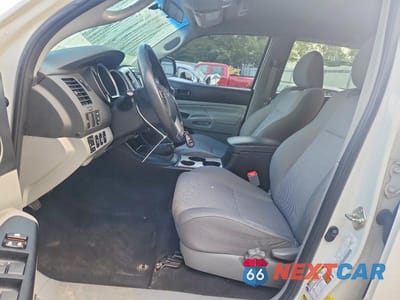 Zdjęcie 7 z 13 samochodu: 2015 TOYOTA TACOMA V6 VIN:5TFLU4EN7FX132802 - miniatura