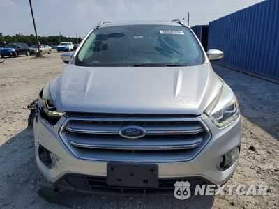 Piąte zdjęcie samochodu w środku: 2017 FORD ESCAPE TITANIUM VIN:1FMCU9J9XHUC63132 - miniatura