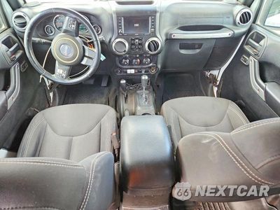 Zdjęcie 8 z 13 samochodu: 2016 JEEP WRANGLER UNLIMITED SAHARA VIN:1C4BJWEG5GL234030 - miniatura