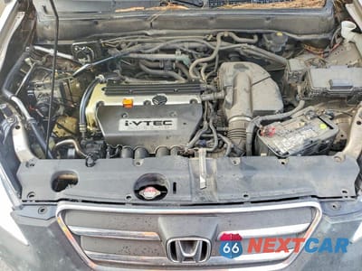 Zdjęcie 12 z 13 samochodu: 2005 HONDA CR-V LX VIN:JHLRD68505C012365 - miniatura
