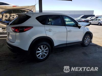 Trzecie zdjęcie samochodu z tyłu: 2016 MAZDA CX-5 TOURING VIN:JM3KE2CY1G0921345 - miniatura