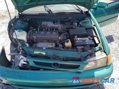 Zdjęcie 11 z 12 samochodu: 1997 TOYOTA COROLLA DX VIN:1NXBB02E8VZ539019 - miniatura
