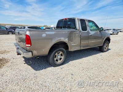 Trzecie zdjęcie samochodu z tyłu: 2002 FORD F150 VIN:1FTRX18L02NB60389 - miniatura