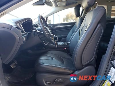 Zdjęcie 7 z 12 samochodu: 2014 FORD FUSION TITANIUM PHEV VIN:3FA6P0SU5ER195287 - miniatura