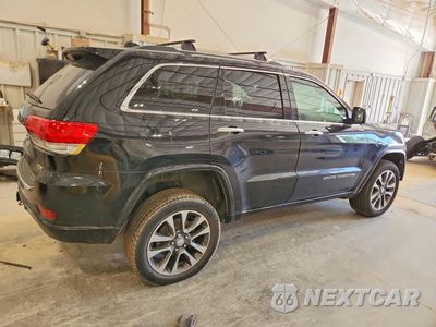 Trzecie zdjęcie samochodu z tyłu: 2017 JEEP GRAND CHEROKEE OVERLAND VIN:1C4RJFCG4HCH15781 - miniatura