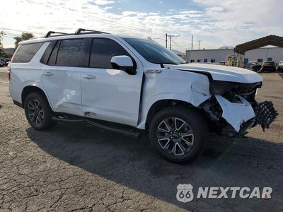 Czwarte zdjęcie samochodu z boku: 2022 CHEVROLET TAHOE K1500 Z71 VIN:1GNSKPKD9NR177586 - miniatura