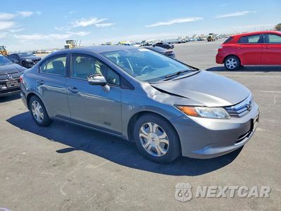 Czwarte zdjęcie samochodu z boku: 2012 HONDA CIVIC HYBRID VIN:JHMFB4F20CS007056 - miniatura