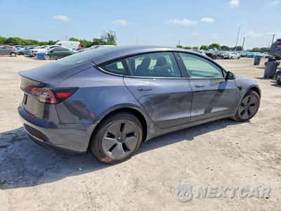 Trzecie zdjęcie samochodu z tyłu: 2023 TESLA MODEL 3 VIN:5YJ3E1EA0PF557007 - miniatura