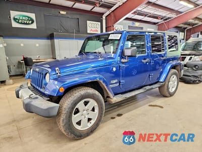 2010 JEEP WRANGLER UNLIMITED SAHARA 1J4BA5H13AL162974 - główne zdjęcie licytacji z USA - miniatura