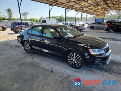 Czwarte zdjęcie samochodu z boku: 2015 VOLKSWAGEN JETTA SE VIN:3VWD17AJ1FM204890 - miniatura