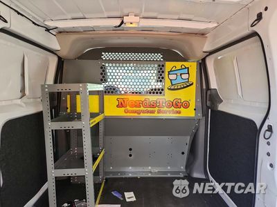 Trzecie zdjęcie samochodu z tyłu: 2021 NISSAN NV200 SV VIN:3N6CM0KN9MK696587 - miniatura